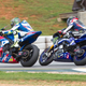 Yamaha’s Cameron Beaubier, right, gets ready to pass Suzuki’s Toni Elias for the win. (Photo credits: Erik Schelzig)